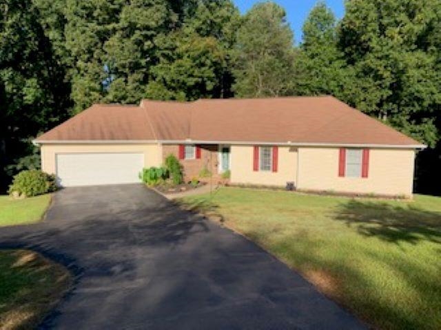 310 Woodsong Dr