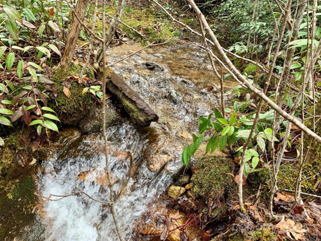Lot 64 Peppervine Circle active home in Round Mountain Falls, Rosman, NC