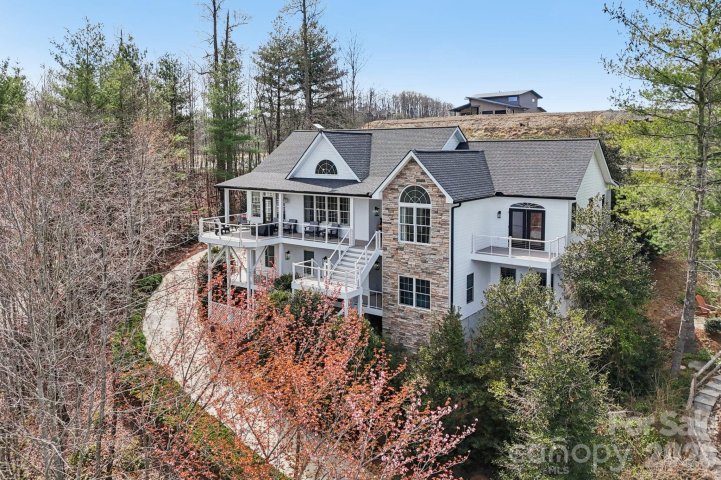 1409 Woodsong Drive active home in Carriage Park, Hendersonville, NC