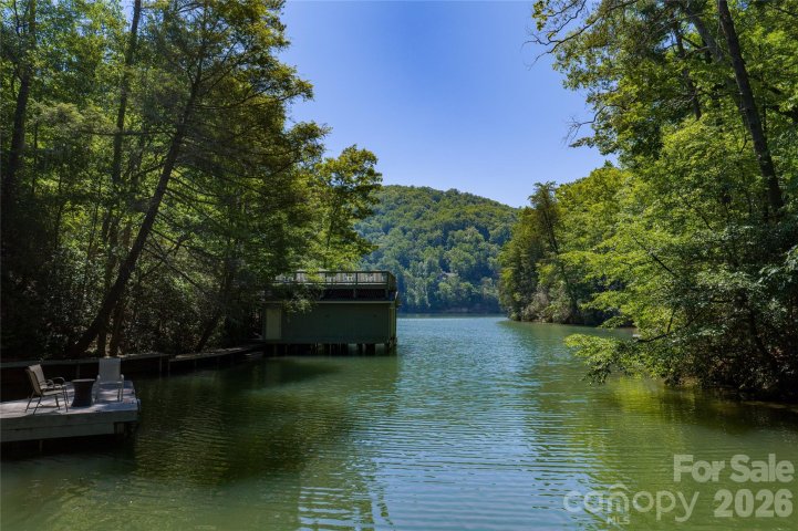 9999 Dogwood Drive active home in Rumbling Bald On Lake Lure, Lake Lure, NC