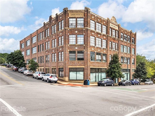 100 Coxe Avenue Unit 309 sold home in Sawyer Motor Building, Asheville, NC