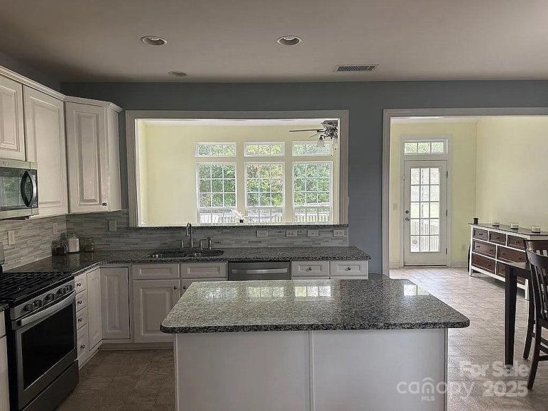 Property image 5 of 219 Flowering Grove Lane in Cherry Grove, Mooresville, NC 28115