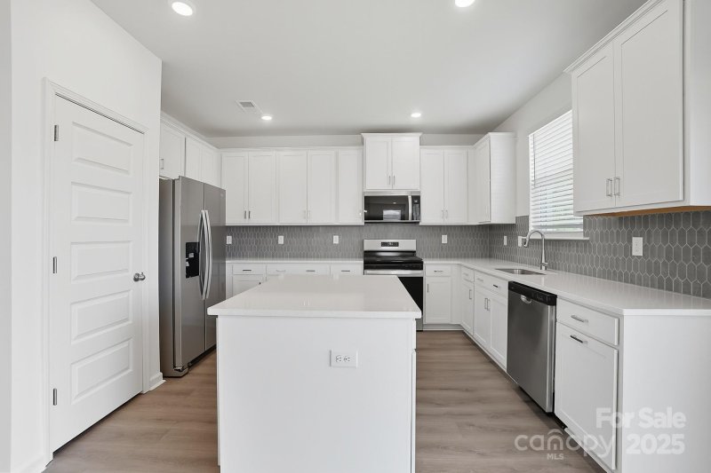 Property image 3 of 329 Knotty Wood Drive in Wellington Pointe, Monroe, NC 28110