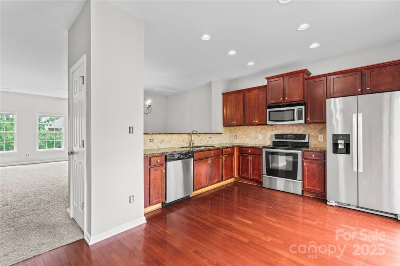 Property image 4 of 9768 Walkers Glen Drive in Moss Creek Village, Concord, NC 28027