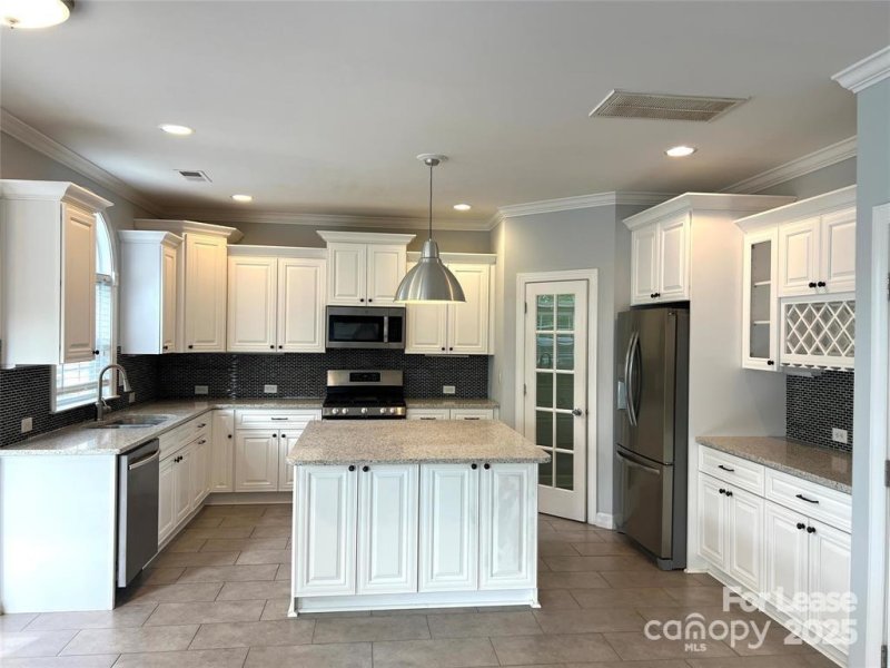 Property image 2 of 9539 Indian Beech Avenue in Moss Creek Village, Concord, NC 28027