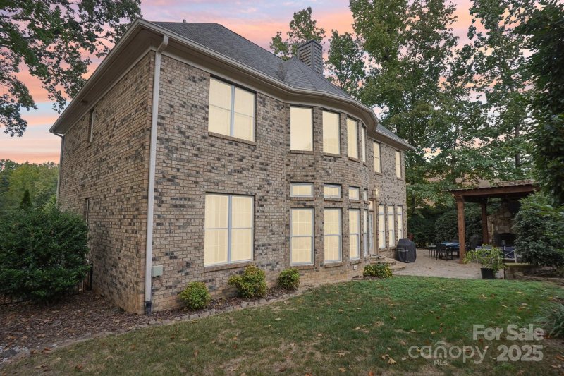 Property image 2 of 7768 Burning Ridge Drive in Treetops At Cowans Ford, Stanley, NC 28164